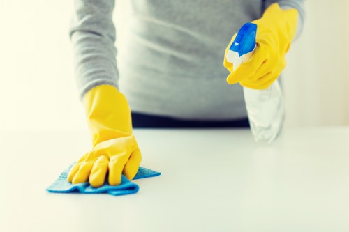Local office cleaning team working in a KT2 meeting room